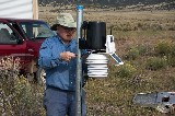 Volunteers installing Weather Station at Hydro Plant - 